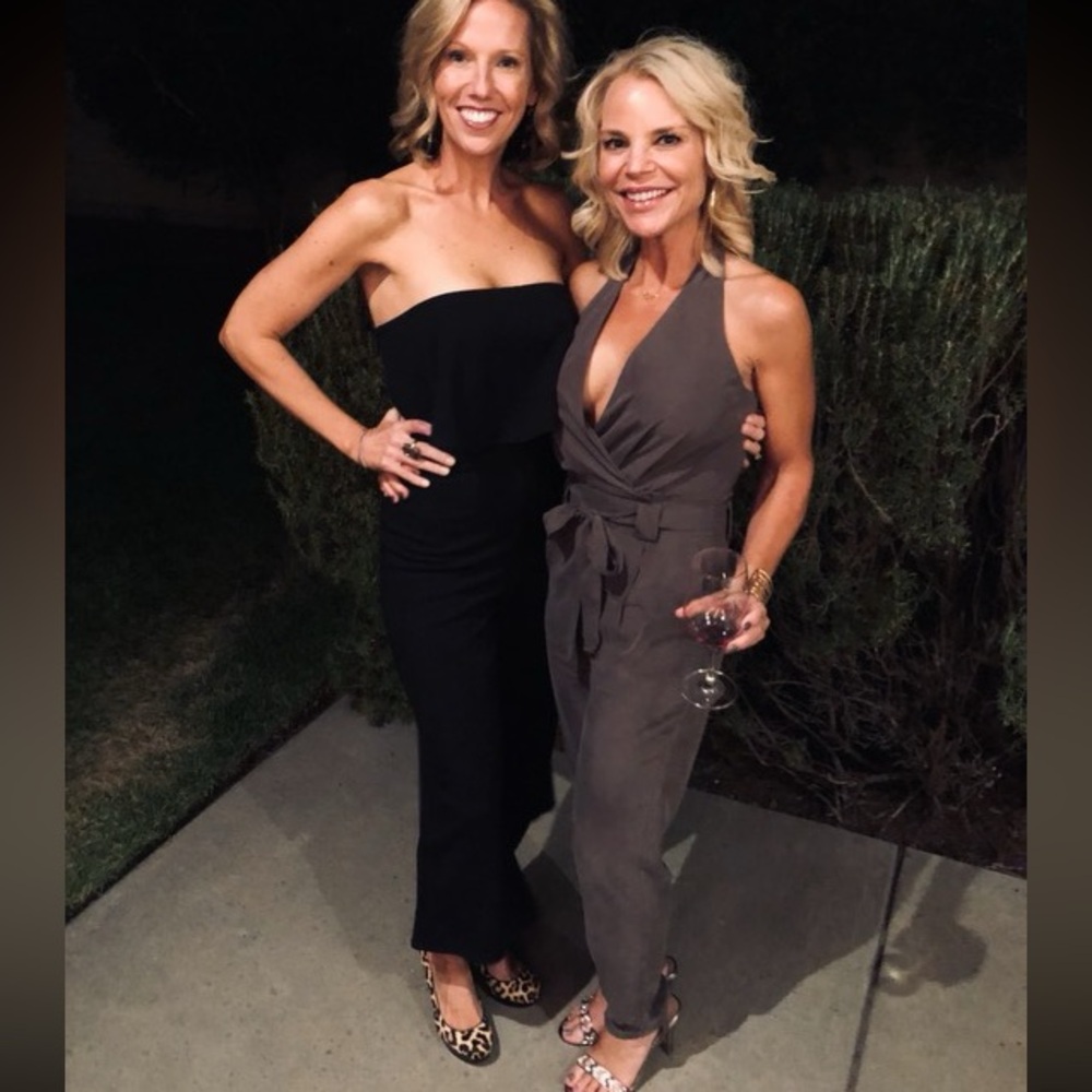 Express romper in olive green. Size 2